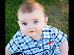 Portrait of cute adorable baby boy smiling and looking at camera. Cute Baby Boy Youtube