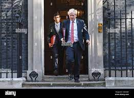 Chancellor of the Exchequer Rishi Sunak (left) and Prime Minister Boris  Johnson leave 10 Downing Street, for a Cabinet meeting to be held at the  Foreign and Commonwealth Office (FCO) in London,