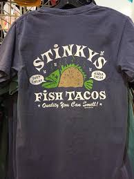 Check spelling or type a new query. La Camisa Souvenir Shoppe New For Men Stinky S Fish Tacos Tee Available In Navy And Emerald For 19 99 S Xl 21 99 2xl Back Of Shirt Shown Facebook