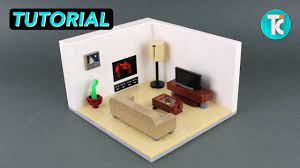 First floor, a living room with two sofas, a table, a bookshelf, two additional small tables, a kitchen, decorated with cushions, candles and flowers. Lego Living Room Tutorial Youtube