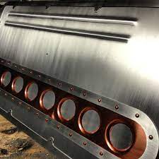Aluminum composite material panels (known as acm panels) are a form of the exterior wall cladding system. Custom Low Lux Aluminum Door Panels All Together Copper Rivets Ryans Sheetmetal Design Custom Car Interior Sheet Metal Work Sheet Metal Fabrication