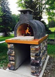 Use appropriate clothing to protect yourself. Wood Fired Brick Pizza Oven With Stucco Coloring And Natural Stone Base By Brickwood Ovens Pizza Oven Brick Pizza Oven Pizza Oven Outdoor Diy