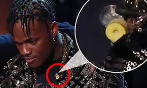 X Factor: Axed Armstrong Martins SLAMS 'fix' rumours after fans spot  earpiece BEFORE sing-off