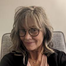 should i get blonde highlights or go natural with my grey hair?