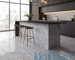 Quarry tile is a lovely and economical flooring option for designing a kitchen with a natural or rustic aesthetic and pairs authentically with decorative spanish or italian tiles. Modern Kitchen Floor Tiles Design