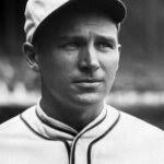 Reds catcher Ed Phelps is knocked unconscious when he is struck by the back  swing of Sam Mertes