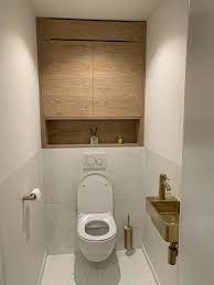 toilet met een golden touch toilet ontwerp toilet kast toilet verbouwing