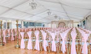Gold Tiffany Chairs Are Certainly The Most Popular Seating Choice For Weddings They Can Also Wedding Ceremony Marquee Marquee Wedding Outdoor Wedding Ceremony
