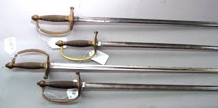The reverse of these fittings display a complex arrangement of floral and vine motifs that surround what also appears the blade is a thick heavy fighting type with a prominent hairpin pattern. Auktion Antique Arms Armour Am 06 12 2005 Lotsearch