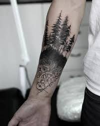 Forest Tattoo Symbolic Meaning Attractive Design Ideas Small Life Subtle Palmtree Armbandtattoo Sun Mount Forest Tattoos Tattoos Arm Tattoos For Guys