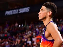 On nba 2k21, the current version of devin booker has an overall 2k rating of 89 with a build of a scoring machine. Devin Booker Face Mask Check Out Suns G Rocking Mask To Protect Nose Injury In Game 3 Vs Clippers Video Draftkings Nation