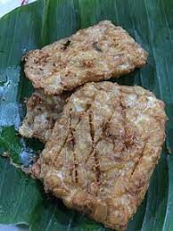 Tempe dan tahu bacem direndam dalam air kelapa dan gula merah. Tempeh Wikipedia