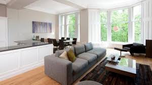 Trials in arranging furniture in a small living room. Ten Tips For The Proper Design Of Rooms Without Borders