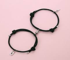 Lacava back caddying for couples this week. Black Thread Magnet Magnetic Key Alloy Couple Bracelet Shape Round Rs 400 Piece Id 23251612897