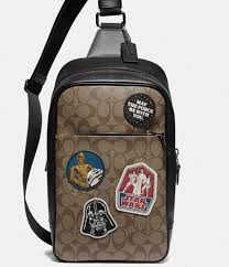 Shop bags, handbags and purses on the coach outlet official site. Not Only Is Coach S Star Wars Collection Out Of This World It S Also On Sale Mickeyblog Com