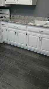 Black And White Luxury Vinyl Floor Tiles Kronoswiss Grand Selection Umber Silverado Grey Oak D4197cr 12mm Laminate Flooring Laminate Flooring In Kitchen Grey Kitchen Floor Laminate Kitchen