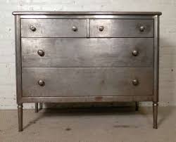 A short dresser in the bedroom makes room for folded clothes while keeping a low profile beneath a window or to accommodate a wall mirror. Mid Century Metal Bedroom Dresser In Rough Finish At 1stdibs