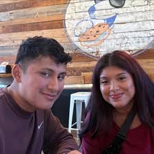 Detective Rhianna Cutler, our amazing School Resource Officer at Manchester  Memorial High, treated the Varsity Football Team to pizza today! Not just  for their big win against Portsmouth