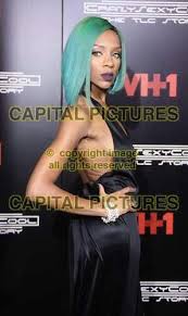 Female Rapper Lil Mama Green Bob Hair Style Purple Matte Lipstick Silk Satin Black Open Back Romper Dress Vh1 Awards Alternative Hair Vh1 Hair