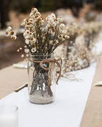 The variety of colors in this bouquet would be beautiful in an autumn arrangement or as wedding bouquets in a rustic themed wedding. 24 Dried Flower Arrangements That Are Perfect For A Fall Wedding Martha Stewart