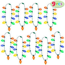 Joyin 9 Piece Christmas Light Up Led 9 Bulbs Necklaces For Christmas Party Favor Supplies In 2020 Christmas Light Necklace Christmas Party Favors Party Favor Supplies
