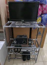Jenis meja tv selanjutnya adalah meja tv yang terbuat dari kayu jati belanda. Rak Serbaguna Meja Tv Rak Helm Rak Sepatu Besi Mebel 538607789