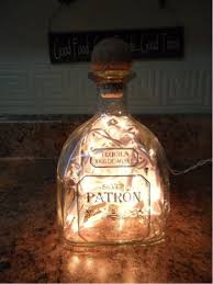 10 Things To Do With A Leftover Liquor Bottle Alcohol Bottle Crafts Patron Bottle Crafts Diy Bottle
