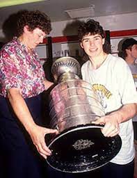 (via @reporterchris and ap photo). Jaromir Jagr Holding The Stanley Cup With His Mom In The Dressing Room 1991 Pittsburgh Sports Hockey Life Pittsburgh Penguins