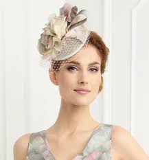 Why do we wear hats to weddings?