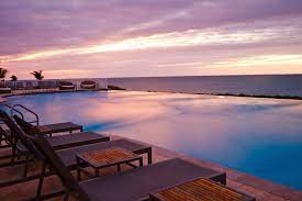 Looking Out To The Atlantic Ocean From The Bimini Bay Resort Infinity Pool At Sunset Bahamas Hotels Bahamas Vacation Caribbean Resort