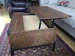 With this lift up coffee table with storage, you can convert your living room or den into an appropriate work place.the table also offers plenty of space for storage for almost anything. Handmade Lift Top Coffee Table By M Karl Llc Custommade Com