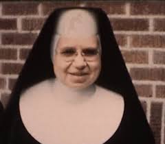 Interior of Saint Anthony and Bridgets Catholic Church, off Creighton Ave.  I am not in the First Communion group I am an angel at /2/3 from left  w/dark hair..Fr. Huminski, who Baptized