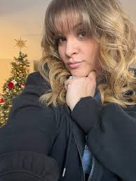 When your hairdresser refuses to chop of 13 inches you settle for bangs