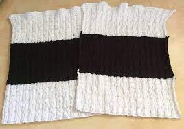 Being found all over the world where climate demands a warm hat, the knit cap can be found under a multitude of local names. Sewing On A Zipper And Lacing Up The Edges On A Knitted Cushion Cover