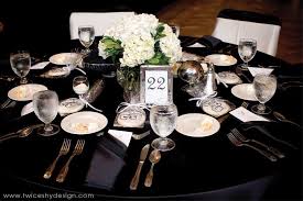 Black Tablecloth With White Flowers And Silver Reflections