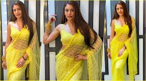 Naagin 5 actress surbhi chandna shared some beautiful pictures of herself dressed in a bridal lehenga with a quirky caption. Naagin 5 Surbhi Chandna As Bani Flaunts Her Hot Navel In Sheer Yellow Saree Check Out Her Sexy Pics Report Door
