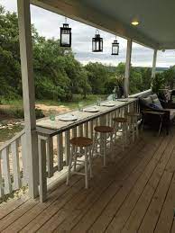 The wide variety of materials and styles includes wood, metal, and horizontal deck railing designs, so you can choose the one that best suits your home's style. 16 Deck Bar Railing Ideas Deck Bar Deck Railings Building A Deck