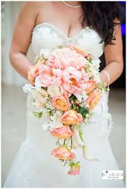 We can discuss the boutonniere that will be match to your wedding colors. Weddings Bouquets Cascading Bridal Bouquet With Boutonniere Coral Peach And Blue Cascade Bouquet Garden Boho Wedding Bouquet Greenhouse Bridal Bouquet