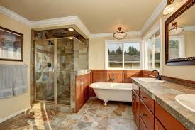 A natural stone bathroom countertop usually consists of a thick solid slab with openings cut for the sinks, but stone countertops can also be created with tiles laid in much the same fashion as ceramic tile countertops. How To Care For Natural Stone Surfaces Lovetoknow
