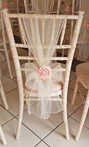Chiavari Chair With Organza Sash Tied In A Bow With Pink Rose To Finish Wedding Chairs Diy Chair Covers Wedding Wedding Chairs