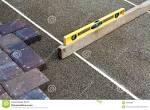 How to level ground before laying pavers - Basic Video -