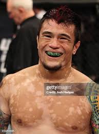 Danny Downes punches Jeremy Stephens during their lightweight fight... News  Photo