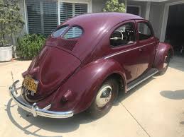 Image result for Bordeaux Red 1950 Beetle