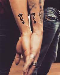 25 Coolest Couple Matching Tattoo Designs For Your Inspiration Women Fashion Lifestyle Blog Shinecoco Com In 2021 Queen Tattoos Couples Tattoo Designs Cute Couple Tattoos