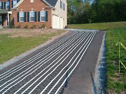 A solar drive way would be a waste of money. Heated Surface Systems Heated Driveway Ranch Style Homes Ranch Style Home