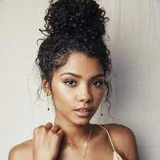 10 Festive Updos For Curly Haired Girls Curly Hair Styles Curly Hair Styles Naturally Curly Bun Hairstyles