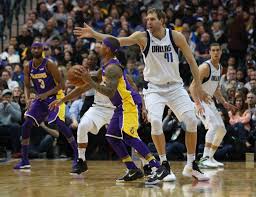 Dallas will use the original logo and have the court designed to feature green, blue, and white for some games. Mavericks Forward Dirk Nowitzki Has Season Ending Ankle Surgery The New York Times