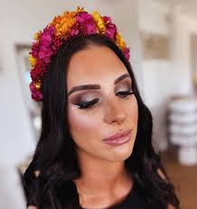 ✨ One of our beautiful clients from New Year's Day is all set! ✨ We created  a soft glam makeup look with subtle smokey eyes and styled her hair in soft,