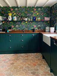 At Home With Interior Designer Sophie Robinson Her Bright And Cheery Hallway Has Dramatic Bluewalls Painted In La Kitchen Interior Home Kitchens Kitchen Decor