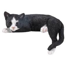 If your animal isn't a lover of bones, that's not a problem. Laying Black White Cat Resin Ornament Vivid Arts Bridgend Garden Centre